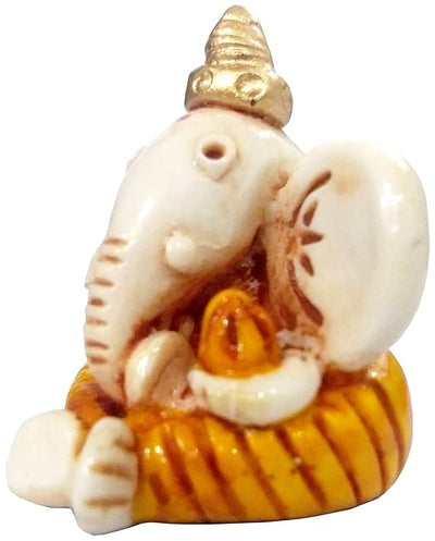 Handmade resin Lord Ganesh idol for car dashboard, symbolizing wisdom and protection, featuring intricate detailing in a compact size.