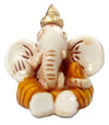 Handmade resin Lord Ganesh idol for car dashboard, symbolizing wisdom and protection, featuring intricate detailing in a compact size.