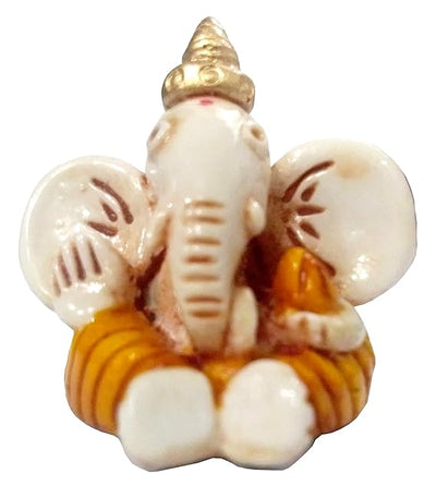 Handmade resin Lord Ganesh idol for car dashboard, symbolizing wisdom and protection, featuring intricate detailing in a compact size.