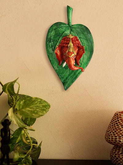 Handmade plastic Lord Ganesh idol, perfect for gifts, featuring vibrant colors and intricate details, symbolizing wisdom and prosperity.