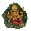 Handmade resin Lord Ganesh idol for pooja rooms, featuring detailed craftsmanship and vibrant colors, symbolizing wisdom and prosperity.