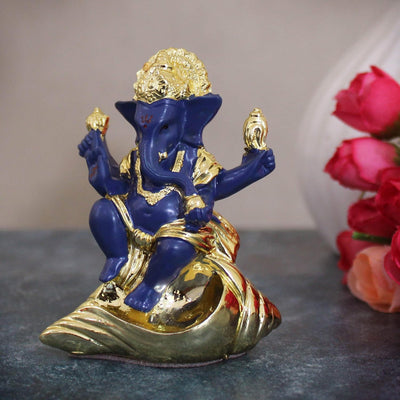 Handmade resin Lord Ganesh idol (7.5 cm x 6 cm) for car dashboards, symbolizing wisdom and prosperity, perfect for enhancing your driving experience.