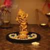 Handmade resin Lord Ganesh idol for pooja rooms, symbolizing wisdom and prosperity, featuring intricate details and vibrant craftsmanship.