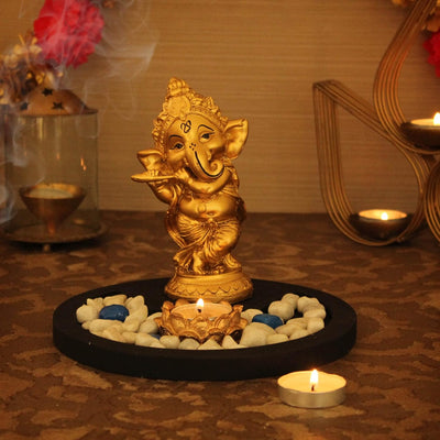 Handmade resin Lord Ganesh idol for pooja rooms, symbolizing wisdom and prosperity, featuring intricate details and vibrant craftsmanship.