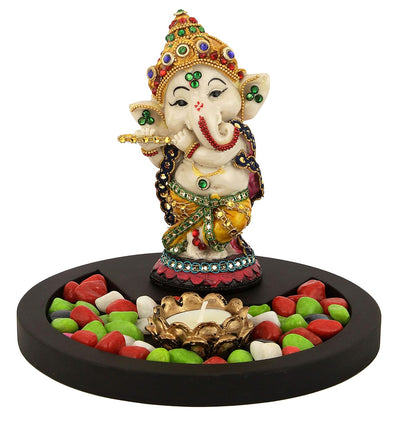 Handmade resin Lord Ganesh idol for pooja rooms, featuring intricate details and vibrant colors, symbolizing wisdom and prosperity.