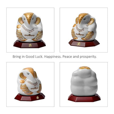 Handmade Lord Ganesh idol for car dashboard and home decor, crafted from ceramic, measuring 5.5L x 3.5W x 5.5H cm, symbolizing wisdom and prosperity.