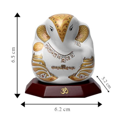 Handmade Lord Ganesh idol for car dashboard and home decor, crafted from ceramic, measuring 5.5L x 3.5W x 5.5H cm, symbolizing wisdom and prosperity.