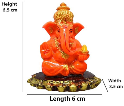 Handmade Lord Ganesh idol for car dashboard and home decor, crafted from resin, measuring 6L x 3.5W x 6.5H cm, symbolizing wisdom and good fortune