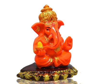 Handmade Lord Ganesh idol for car dashboard and home decor, crafted from resin, measuring 6L x 3.5W x 6.5H cm, symbolizing wisdom and good fortune.