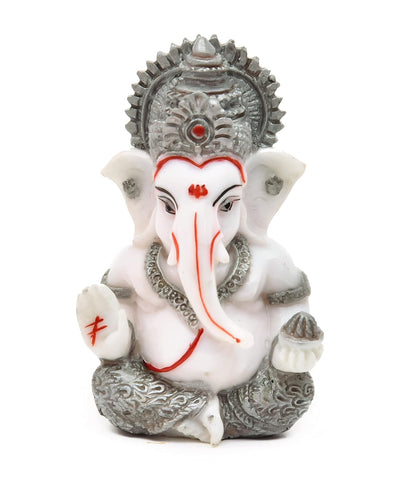 Handmade Lord Ganesh idol for car dashboard, crafted from marble, measuring 5.1L x 5.1W x 7.6H cm, symbolizing wisdom and prosperity.