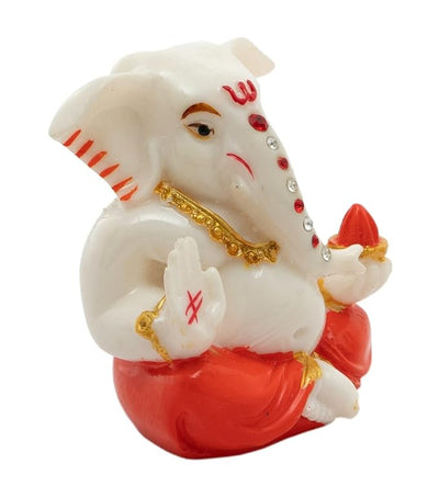 Handmade Lord Ganesh idol showpiece for car dashboard, crafted from resin, measuring 6L x 3W x 7H cm, symbolizing blessings and protection.