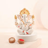 Handmade Lord Ganesh idol showpiece for home decor, crafted from resin, measuring 15L x 12W x 10H cm, symbolizing wisdom and prosperity