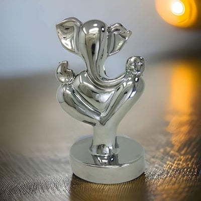 Handmade Lord Ganesh idol crafted from resin, measuring 9L x 9W x 15H cm, symbolizing wisdom and prosperity for home decor