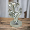 Handmade Lord Ganesh idol crafted from resin, measuring 9L x 9W x 15H cm, symbolizing wisdom and prosperity for home decor.