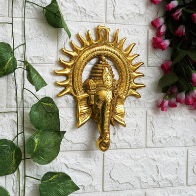 Handmade Lord Ganesh idol wall hanging, crafted from metal, measuring 20L x 2.5W x 24H cm, symbolizing wisdom and prosperity for home decor