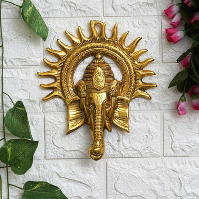 Handmade Lord Ganesh idol wall hanging, crafted from metal, measuring 20L x 2.5W x 24H cm, symbolizing wisdom and prosperity for home decor