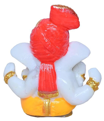 A beautifully crafted Lord Ganesha idol made of polyresin, showcasing intricate details and a gold-plated finish, symbolizing prosperity and wisdom.