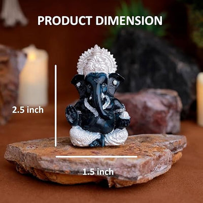 A silver-plated Lord Ganesha idol made of resin, intricately designed, measuring 5x5x5 cm, symbolizing wisdom and prosperity, perfect for decor.