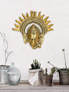 Handmade metal Ganesha wall sculpture with a leaf-shaped design, gold finish, 17.78x17.78 cm, 300g. Ideal for home decor and inviting prosperity and wisdom.