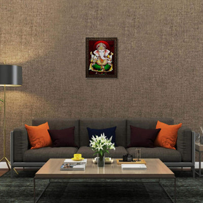 Framed wall art of Lord Ganesha made from synthetic wood, featuring vibrant colors and intricate details, perfect for home decor.