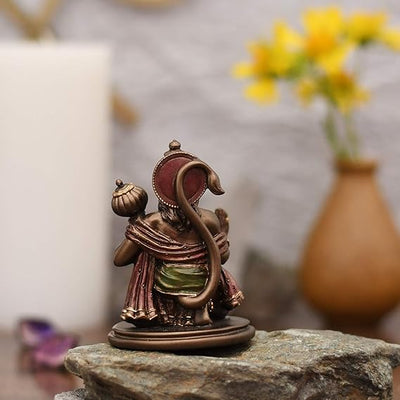 Handmade brass statue of Lord Hanuman, symbolizing strength and protection, measuring 6L x 6W x 8H cm, perfect for home altars and decor