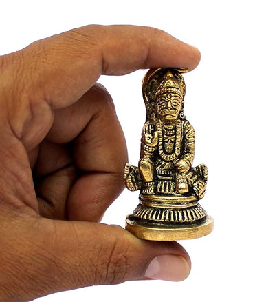Handmade brass idol of Lord Hanuman Ji, showcasing intricate craftsmanship, ideal for spiritual decor and enhancing devotion.