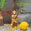 Handmade Lord Hanuman Ji idol in golden polyresin, ideal for altars and puja mandirs, showcasing intricate details and divine presence.