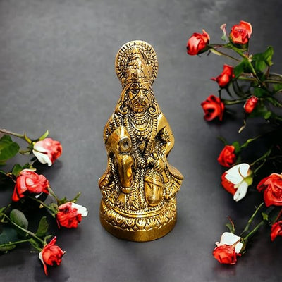 "Handmade metal statue of Lord Hanuman with a golden finish, symbolizing strength and devotion, suitable for home or office decor."