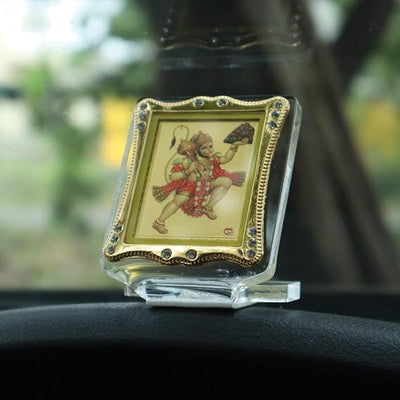"Handmade acrylic statue of Lord Hanuman, symbolizing strength and protection, designed for car dashboards or home altars."