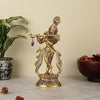 Handmade golden idol of Lord Krishna crafted in aluminum, showcasing intricate details, ideal for home altar or decor