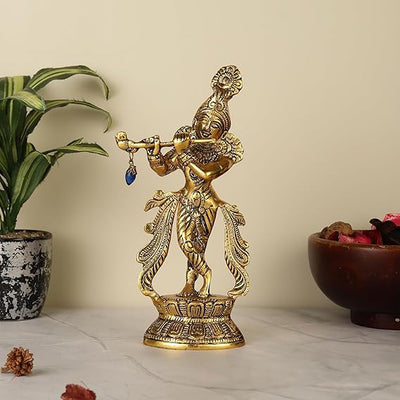 Handmade golden idol of Lord Krishna crafted in aluminum, showcasing intricate details, ideal for home altar or decor