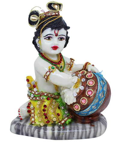 Handmade Lord Krishna resin statue depicting the mischievous cowherd, ideal for home decor, altars, and spiritual spaces.
