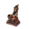 Handmade brass Lord Krishna Makhan Chor idol, depicting the playful deity stealing butter, ideal for altars and spiritual spaces.