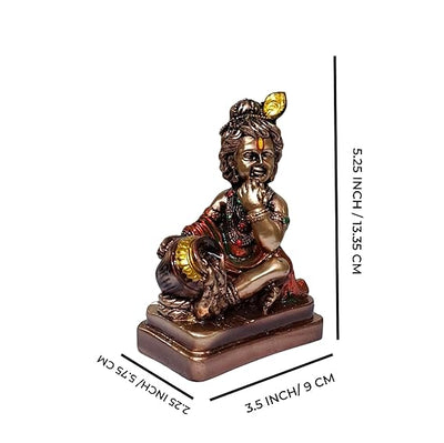 Handmade brass Lord Krishna Makhan Chor idol, depicting the playful deity stealing butter, ideal for altars and spiritual spaces.