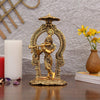 Handcrafted metal statue of Lord Krishna playing the flute, featuring a gold finish, symbolizing joy and devotion.