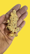 Handmade golden Lord Muruga idol with intricate details and double-sided design, ideal for home, office, or car dashboard decor.