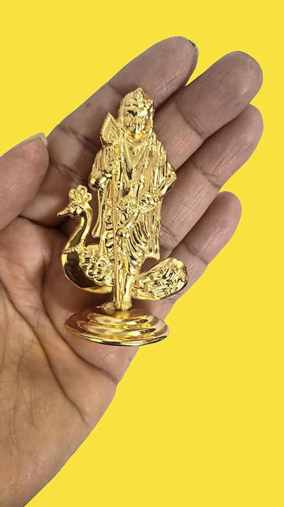 Handmade golden Lord Muruga idol with intricate details and double-sided design, ideal for home, office, or car dashboard decor.