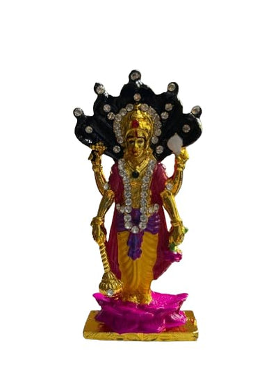 Handcrafted brass idol of Lord Narayan, showcasing intricate detailing, symbolizing preservation and spirituality in Hinduism.