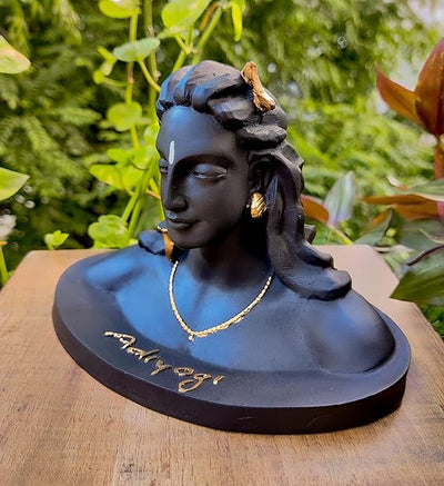 Handcrafted Lord Shiva idol in a serene meditative pose, made from durable aluminum, ideal for home altars and spiritual decor.