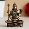 Hand-carved Lord Shiva statue in a meditative pose, crafted from solid cold cast bronze, ideal for enhancing spiritual spaces.