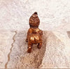 Handmade Lord Baby Krishna idol crafted from copper, featuring intricate detailing. Ideal for home altars and decor, symbolizing faith and spirituality