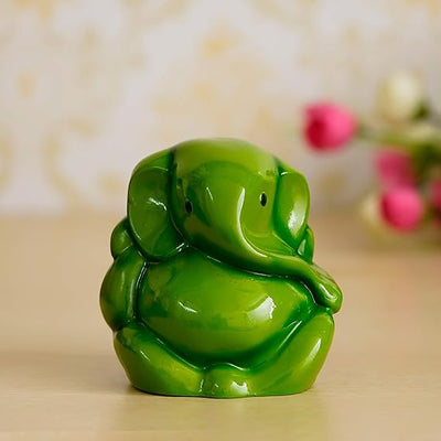 Handmade Lord Ganesha idol crafted from resin, symbolizing prosperity and success. Ideal for home, office, or altar decor
