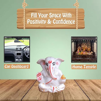 Handmade silver-plated Lord Ganesha idol crafted from resin, symbolizing prosperity and success. Ideal for home, office, or altar decor