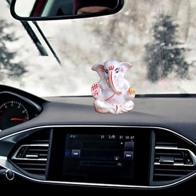 Handmade silver-plated Lord Ganesha idol crafted from resin, symbolizing prosperity and success. Ideal for home, office, or altar decor