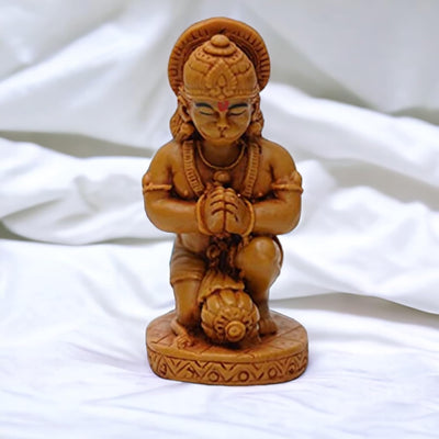 Handmade resin idol of Lord Hanuman, featuring a serene design, ideal for home altar or decor, symbolizing protection and devotion in Hinduism.