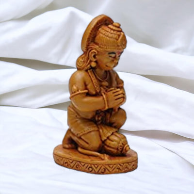 Handmade resin idol of Lord Hanuman, featuring a serene design, ideal for home altar or decor, symbolizing protection and devotion in Hinduism.