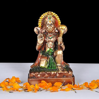 A beautifully crafted resin idol of Lord Hanuman in a meditative pose, showcasing intricate details and a serene expression, ideal for spiritual decor.