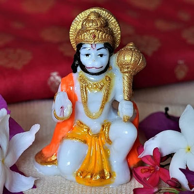 Handmade Lord Hanuman Ji marble dust idol in a seated posture, symbolizing strength and protection, perfect for altars and home decor.