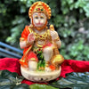 Handmade Lord Hanuman Ji polyresin idol in a seated posture, symbolizing strength and protection, perfect for altars and home decoration.
