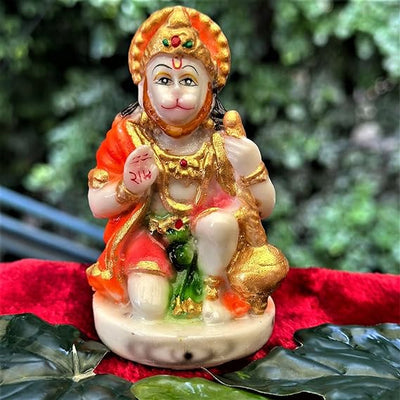 Handmade Lord Hanuman Ji polyresin idol in a seated posture, symbolizing strength and protection, perfect for altars and home decoration.